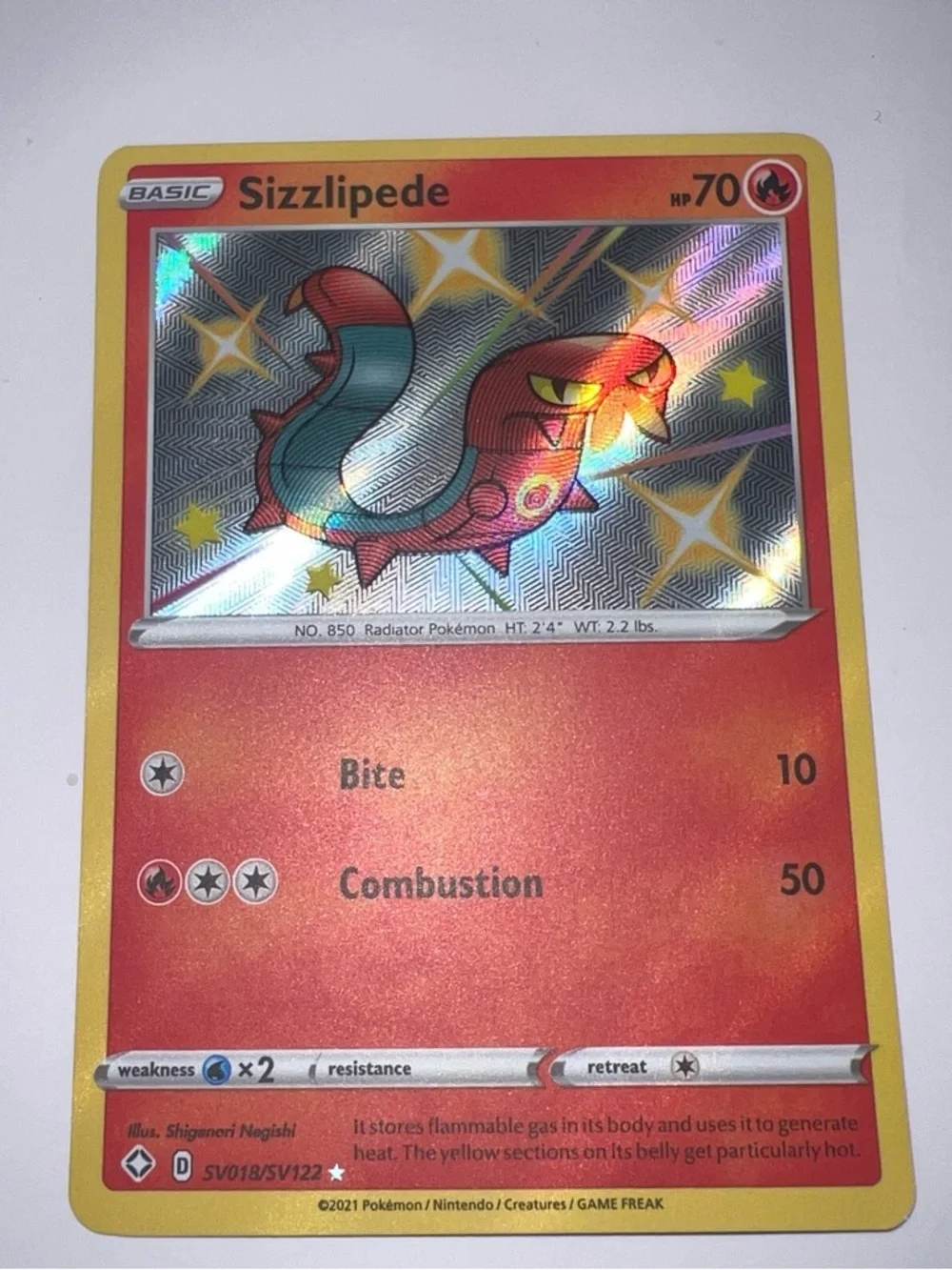 Pokemon Sizzlipede Holographic Card - Red/Yellow/Orange